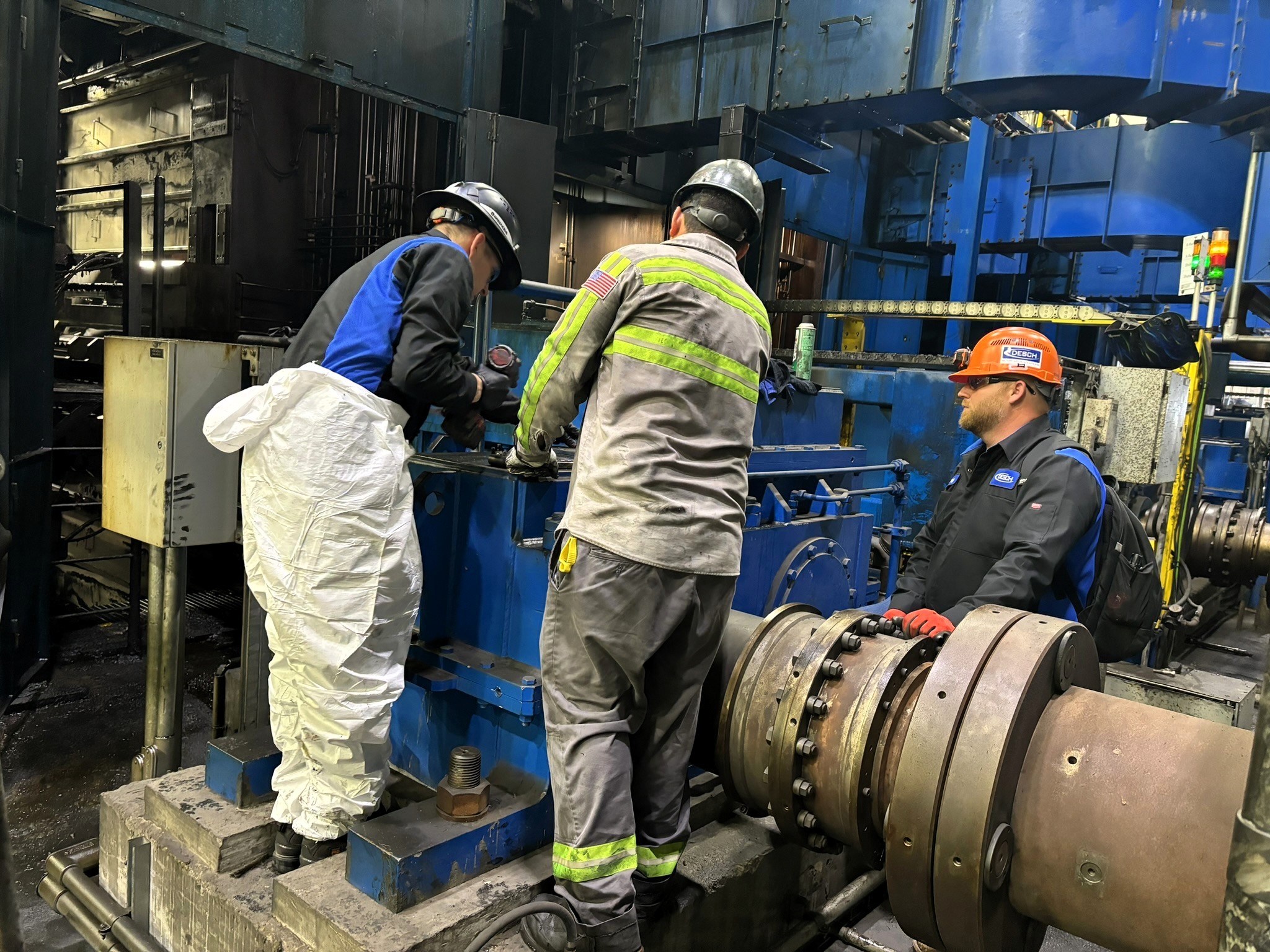 DESCH technicians working on industrial drive equipment